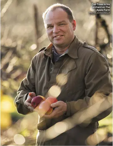  ?? PHOTO: JOHN D KELLY ?? biology at the University of Limerick; between the farm and the university, his time is precious.Asked what his hobbies might be, Con says: “Let’s put it this way, when Trina buys Con Traas in his orchard on The Apple Farm me a Christmas present, it is always a book on science. Between the farm and the university, I have little time for anything else.”