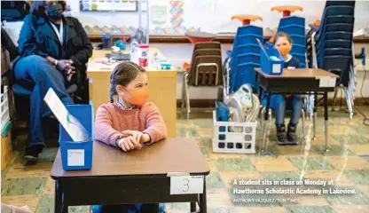  ?? ANTHONY VAZQUEZ/SUN-TIMES ?? A student sits in class on Monday at Hawthorne Scholastic Academy in Lakeview.