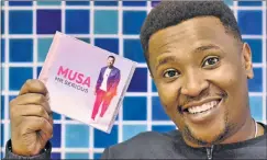  ?? Picture: IVOR MARKMAN ?? SERIOUS STUFF: Musa shows off his CD