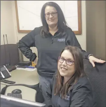  ??  ?? Wapakoneta Police Records Clerk and dispatcher Nikki Sawmiller was in the dispatch office area with fellow dispatcher Jessica Rush.
