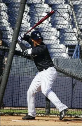  ?? MATT ROURKE - THE ASSOCIATED PRESS ?? FILE - In this Feb. 17, 2017, file photo, New York Yankees’ Gleyber Torres during a spring training baseball workout in Tampa, Fla. Top Yankees prospect Torres has a torn ligament in his non-throwing elbow and will have Tommy John surgery that will...