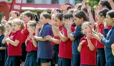  ?? WARWICK SMITH/STUFF ?? Milson School kapa haka group welcomes White Ribbon riders to Te Marae o Hine – The Square.