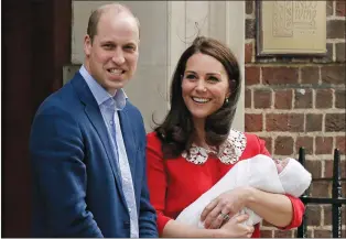  ?? AP PHOTO TIM IRELAND ?? Britain’s Prince William and Kate, Duchess of Cambridge smile as they hold their newborn baby son as they leave the Lindo wing at St Mary’s Hospital in London on Monday.