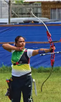  ?? MACKY LIM ?? ON TARGET. Davao City archer Kristine Madeline Ibag aims to hit the mark during the Batang Pinoy 2019 Mindanao Qualifying Leg at the Davao del Norte Sports and Tourism Complex archery range yesterday.