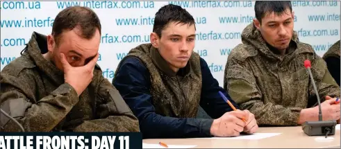  ?? ?? MESSAGES HOME: Russian troops at a press conference in Kyiv yesterday