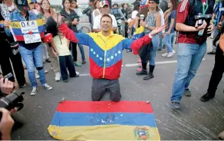  ?? AP ?? Las protestas de la oposición continuaro­n ayer en Caracas.