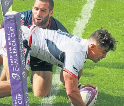  ?? Picture: Shuttersto­ck. ?? Edinburgh winger Damien Hoyland dives in at the corner for a second half try – but it was all to no avail as the capital side crashed out of the European Challenge Cup at the quarterfin­al stage.