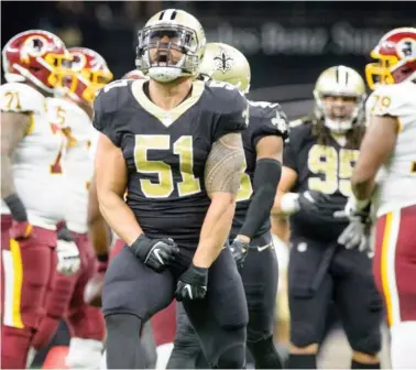  ?? Scott Clause, The Daily Advertiser, AP) (Photo by ?? New Orleans linebacker Manti Te’o celebrates after making a tackle against Washington on Sunday.