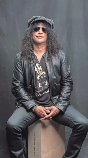  ?? JASON ARMRESTO/USA TODAY ?? “I still listen to a lot of old stuff because the rock ’n’ roll that turned me on as a kid, not too much of it exists,” Slash says.