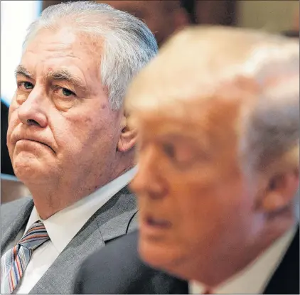  ?? AP PHOTO ?? In this Jan. 10 photo, U.S. Secretary of State Rex Tillerson listens as President Donald Trump speaks during a cabinet meeting at the White House in Washington. Trump fired Tillerson as secretary of state earlier this week, naming CIA director Mike Pompeo to replace him.