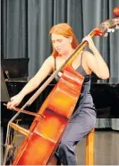  ?? Photos / Chris Marshall ?? Amy Aldridge, Grade 8 double bass.
Kayley Rosal (left) performs Gade 2 Piano in the Trinity Concert on the Great Lake Centre’s Grotrian grand piano.