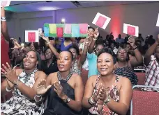  ??  ?? Supporters having a good time at Miss Universe Jamaica North West.