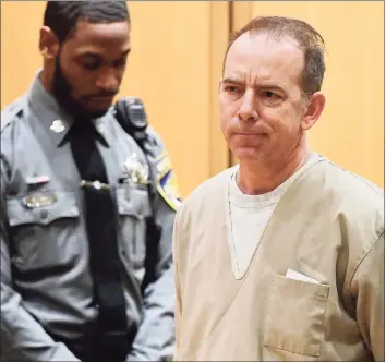 ?? Erik Trautmann / Hearst Connecticu­t Media ?? Kent Mawhinney, 54, appears in Stamford court with his attorneys to enter a plea to a conspiracy to commit murder charge in connection with the death of Jennifer Dulos on Feb. 20 in Stamford.