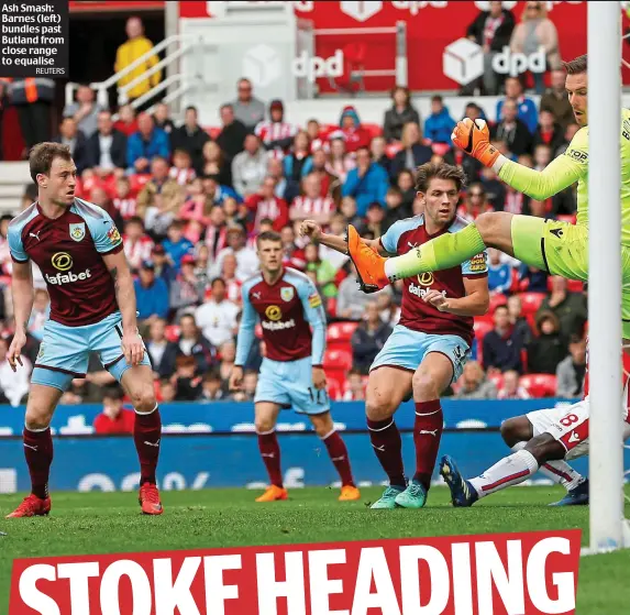  ?? REUTERS ?? Ash Smash: Barnes (left) bundles past Butland from close range to equalise