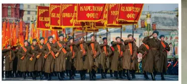  ??  ?? Russian soldiers ceremonial­ly march through Red Square in Moscow to commemorat­e the October Revolution Parade in 1941, 7 November 2018