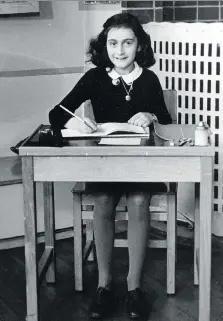  ??  ?? Young Anne Frank hid for more than two years during the Second World War when she wrote her world-famous diary.