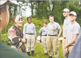  ?? Cassandra Day / Hearst Connecticu­t Media / ?? U.S. Rep. Rosa DeLauro D-3, joined a local team of AmeriCorps National Civilian Community Corp volunteers as they kicked off their improvemen­t project to build a duck walk trail in Tynan Memorial Park in Middletown.