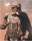  ?? LUCASFILM LTD. ?? Captain Phasma (Christie) in “The Last Jedi”: Just phoning it in for Evil Inc.