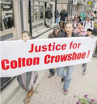  ?? LYLE ASPINALL/ FILES ?? A group demonstrat­es in September 2014, demanding justice for Colton Crowshoe, whose initial disappeara­nce they say was dismissed by police because he was native.