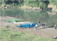  ??  ?? GETAWAY: A military photo shows boats allegedly used by Abu Sayyaf militants to enter the Ibananga River for a planned attack.