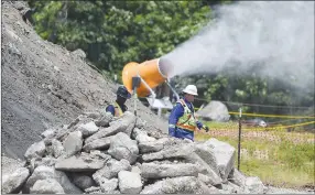  ?? Charlie Kaijo/NWA Democrat-Gazette File Photo ?? A crew works, Friday, May 24, 2019 at the Stump Dump site in Bella Vista.