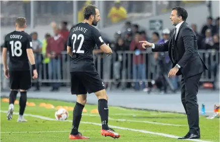  ?? Picture / AP ?? Anthony Hudson (right) has done a great job with Andrew Durante and the All Whites, according to NZ Football chief executive Andy Martin.