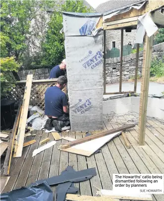  ??  ?? The Howarths’ catio being dismantled following an order by planners
SUE HOWARTH