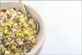  ?? MILK STREET VIA AP ?? This image released by Milk Street shows a recipe for charred corn with coconut, chilies and lime.