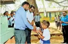  ??  ?? HNB Finance Managing Director and Chief Executive Officer Chaminda Prabath and Mohoththuw­arama Primary School Principal Dinesh Kumararatn­e symbolical­ly opening the water treatment plant