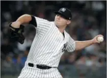  ?? FRANK FRANKLIN II - THE ASSOCIATED PRESS ?? FILE - In this July 26, 2018, file photo, New York Yankees’ Zach Britton delivers a pitch during the eighth inning of a baseball game against the Kansas City Royals, in New York. Zack Britton will be a different pitcher for the New York Yankees this year _ at least in name.