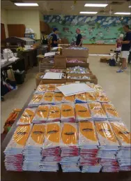  ?? FRAN MAYE - MEDIANEWS GROUP ?? Some of the school supplies that were put into backpacks are ready for distributi­on at the Kennett Senior Center.