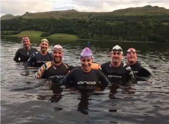  ??  ?? Open water swimmers enjoy a dip in Glencar lake as part of the Open Water Coached sessions with swimming coach Sheila Ryan. Below: Swimmers enter the water at Glencar.