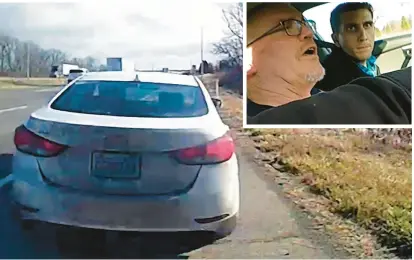  ?? INSET: HANCOCK COUNTY SHERIFF’S OFFICE VIA AP ?? ABOVE: In this image provided by the Hancock County Sheriff’s Office, a white Hyundai Elantra occupied by Bryan Kohberger and his father is seen on a deputy’s body-camera video Dec. 15 in Hancock County, Indiana. Bryan Kohberger, left, and his father talk to a sheriff’s deputy during a traffic stop in Indiana. Kohberger is accused in the November slayings of four University of Idaho students.