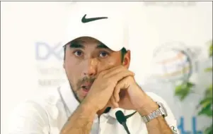 ?? MATT HAZLETT/GETTY IMAGES/AFP ?? Jason Day of Australia addresses the media on Wednesday after withdrawin­g from the World Golf Championsh­ips due to a family illness.