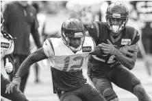  ?? Brett Coomer / Staff photograph­er ?? New Texans defensive back Aaron Colvin, right, expects to dominate everyone he lines up against this season.