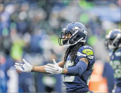  ?? AP PHOTO ?? Seattle Seahawks cornerback Richard Sherman reacts to a play against the Washington Redskins in an NFL game on Nov. 5 in Seattle.