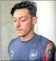  ?? DPA-BILD: SATOR ?? In Singapur beim Training: Mesut Özil