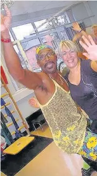  ??  ?? ●●Mr Motivator made an appearance to meet Observer competitio­n winner Mandy Davies in the physiother­apy unit at Highfield Hospital.=