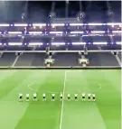  ??  ?? Show time: Dancers in Spurs kit line up on the pitch at the new stadium