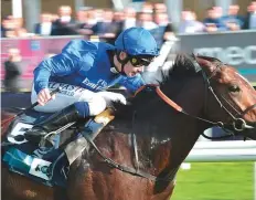  ?? Rex Features ?? Royal Marine (ridden by Oisin Murphy) was one of two winners Godolphin celebrated at Longchamp yesterday.