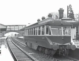  ?? TRANSPORT TREASURY/PETER GRAY ?? Pre-Nationalis­ation diesel: On a wet and dreary November 26, 1960, GWR diesel railcar W20W rests at the Worcesters­hire station of Droitwich Spa. Within two years it was withdrawn, but it was saved for preservati­on and is currently undergoing a long-term and extensive overhaul at the Kent & East Sussex Railway.