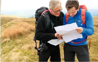  ??  ?? PENNINE WAY Our walk samples a leg of Britain’s first national trail: the 268-mile Pennine Way, opened in 1965. MAP MAN & COMPASS KID Getting our bearings amid the muddling moorland of the North Pennines.