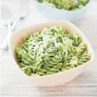  ?? AMERICA’S TEST KITCHEN VIA AP ?? This recipe for pasta with kale and sunflower seed pesto appears in “Cooking At Home With Bridget And Julia.”