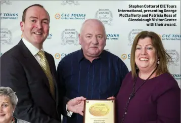  ??  ?? Stephen Cotterof CIE Tours Internatio­nal, presenting George McClaffert­y and Patricia Ross of Glendaloug­h Visitor Centre with their award.