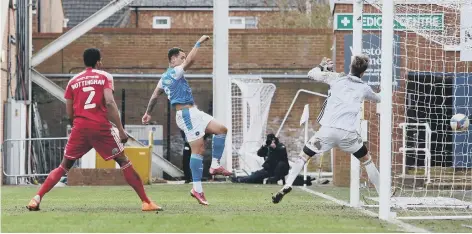  ??  ?? 5-0! Jonson Clarke-Harris completes his hat-trick.