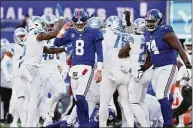  ?? Jamie Squire / Getty Images ?? Daniel Jones (8) of the New York Giants reacts after throwing an intercepti­on against the Detroit Lions during the third quarter at MetLife Stadium on Sunday in East Rutherford, N.J.