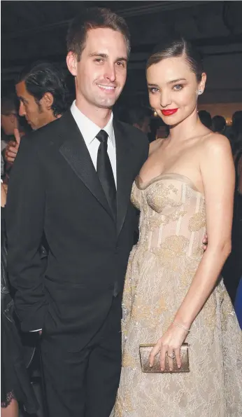  ??  ?? Snapchat founder Evan Spiegel and model Miranda Kerr have tied the knot. Picture: GETTY IMAGES