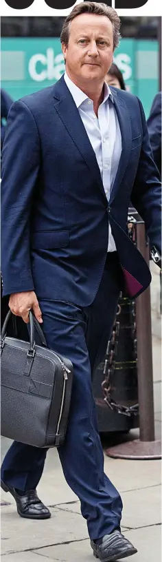  ??  ?? Last show: Mr Cameron carries his own bag last week for his final appearance at the Commons as a humble MP
