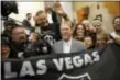  ?? JOHN LOCHER — THE ASSOCIATED PRESS FILE ?? In this file photo, Oakland Raiders Owner Mark Davis, center, meets with Raiders fans after speaking at a meeting of the Southern Nevada Tourism Infrastruc­ture Committee in Las Vegas. Proponents who want to build an NFL-ready stadium and attract the...