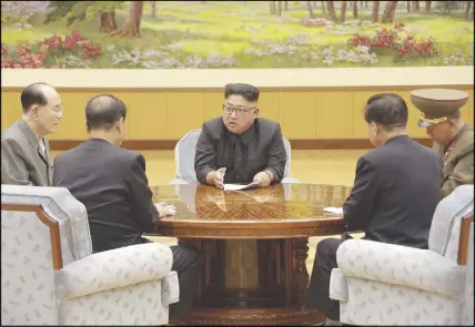  ?? AP PHOTO ?? North Korea’s leader Kim Jong Un holds a meeting of the ruling party’s presidium. North Korea claimed a “perfect success” for its most powerful nuclear test so far, a further step in the developmen­t of weapons capable of striking anywhere in the United...